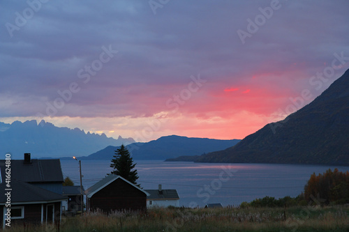 Emotional pink sunset above the Norwegian fjords and beyond the arctic circle.