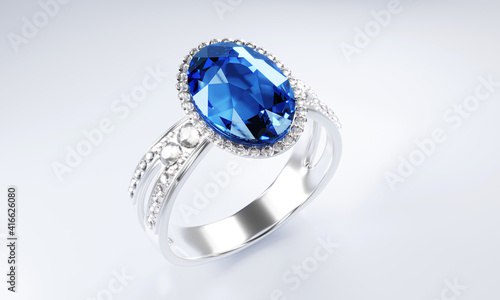 The large blue diamond oval shape is surrounded by many diamonds on the ring made of platinum gold placed on a gray background. Elegant wedding diamond ring for women.  3d rendering