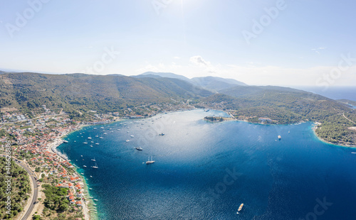Aerial drone shot of town port Adriatic coastline on Vis Island in Croatia summer
