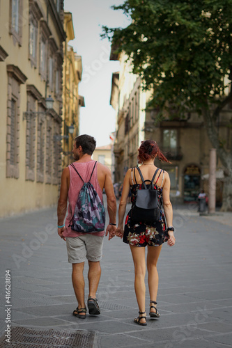 Young couple in love walking in the city. © Pier Fax