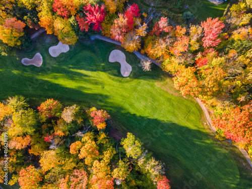 Beautiful late day sun light  on the Caberfae Peaks Golf course in autumn - central Michigan countryside near Cadillac