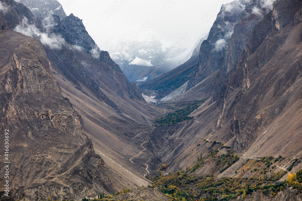 Road in dry canyon Karakorum mountains Hunza Valley. High quality photo
