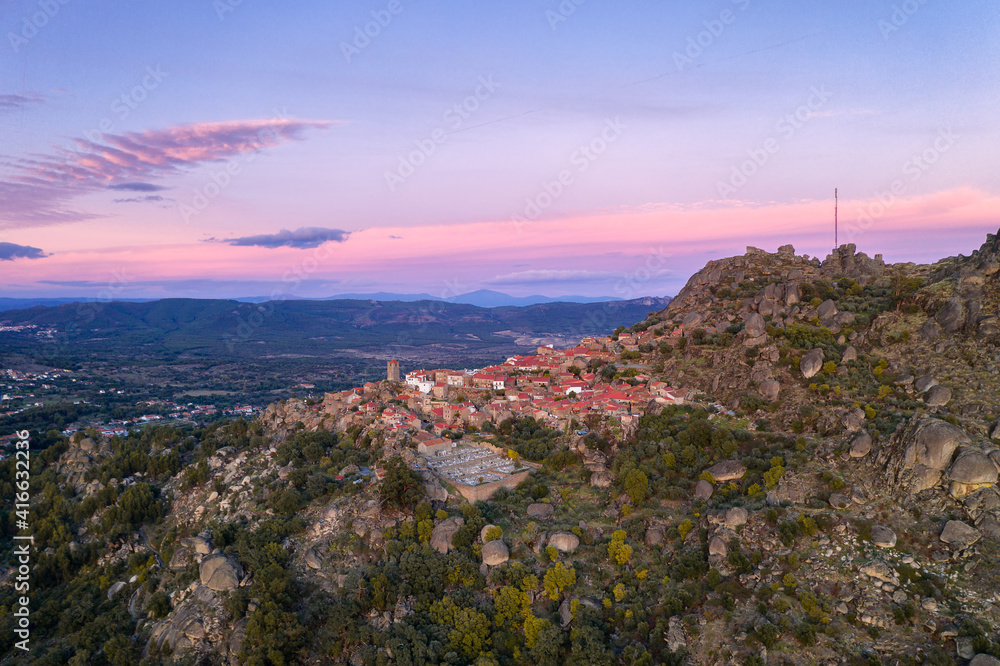 Drone aerial panorama view of Monsanto historic village at sunset, in Portugal
