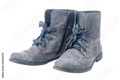 Vintage graphite boots of suede isolated on white background.