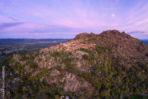 Drone aerial panorama view of Monsanto historic village at sunset, in Portugal photo