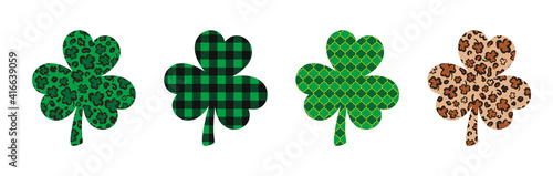 Set of 4 Shamrock or clover leaves made of Leopard print, buffalo plaid, arabesque tile. Saint Patricks Day symbol. Vector template for St. Patrick s Day banner, poster, flyer, sticker, postcard photo