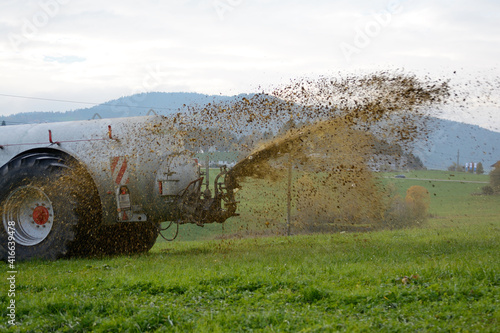Manure Application On A Meadow photo