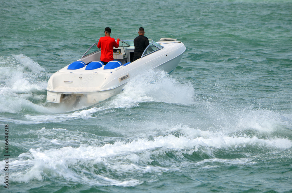 



Small high-end sporty run-about motor boat.

