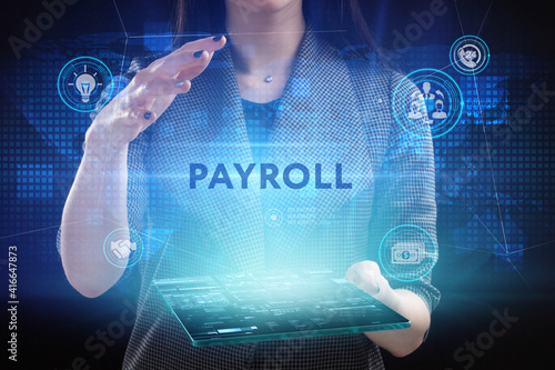 Business, Technology, Internet and network concept. Young businessman working on a virtual screen of the future and sees the inscription: Payroll