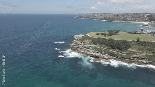 Waves Crashing At Rocky Inlet And Cliffs Of Mackenzies Point - Marks Park And Coastal Walk At  Peninsula In NSW, Australia. - aerial photo