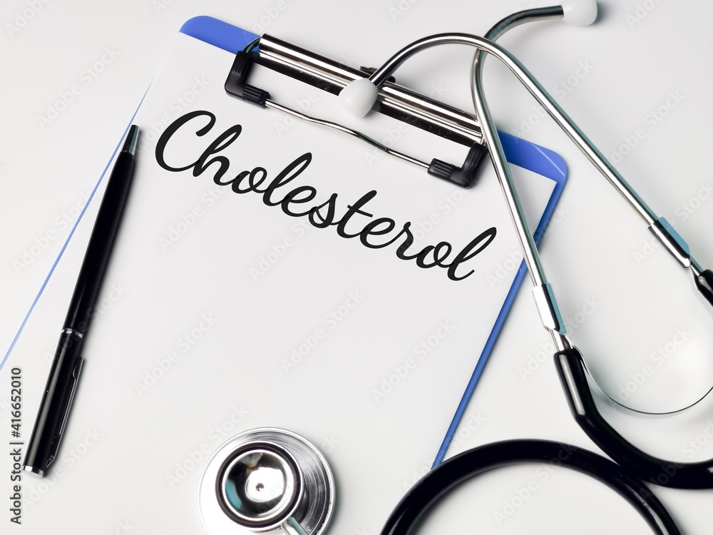 Medical and health concept. Phrase CHOLESTEROL written on paper clipboard with stethoscope and a pen. Medical and health concept. Phrase CHOLESTEROL written on paper clipboard with stethoscope and a pen.