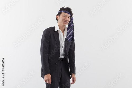 A young drunken Asian business man