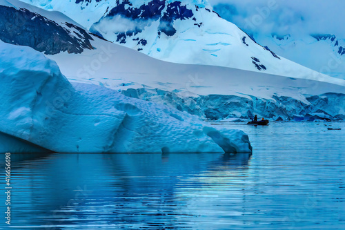 Boat Glacier Snow Mountains Paradise Bay Skintorp Cove Antarctica photo