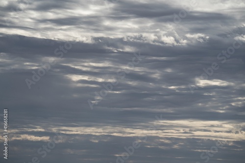 This nature photo captures a scenic cloudscape rolling through the sky.
