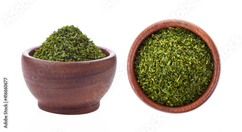 dry thyme in wood bowl on white background