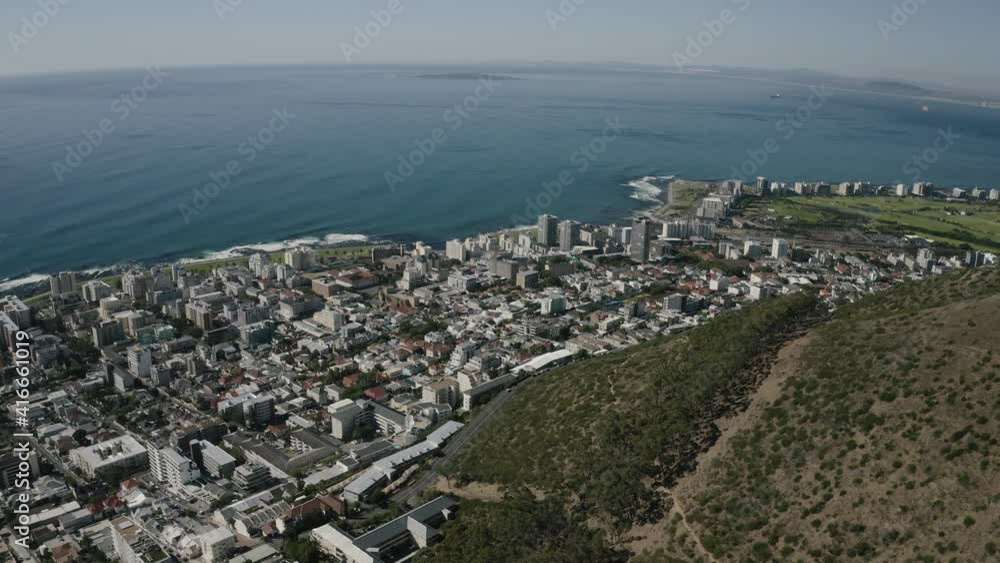 Aerial view of CBD of Cape Town, Western Cape, South Africa, with City bowl, Zonnebloem, Gardens, Oranjezicht, Central Business District, Victoria and Alfred Waterfront and Table Mountain by drone