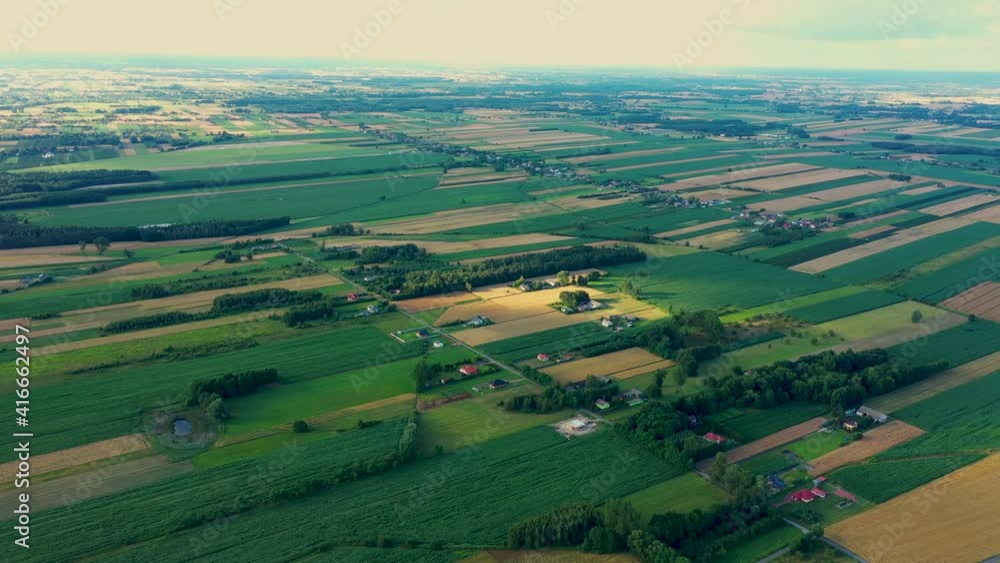 Abstract geometric shapes of agricultural parcels of different crops in yellow and green colors. Aerial view shoot from drone directly above field Abstract geometric shapes of agricultural parcels of different crops in yellow and green colors. Aerial view shoot from drone directly above field