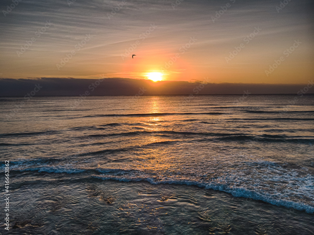 Naklejka premium sunset over the sea