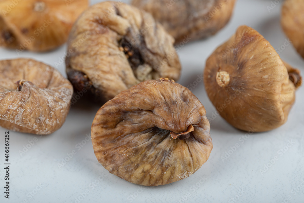 Yummy dried figs on white background Yummy dried figs on white background