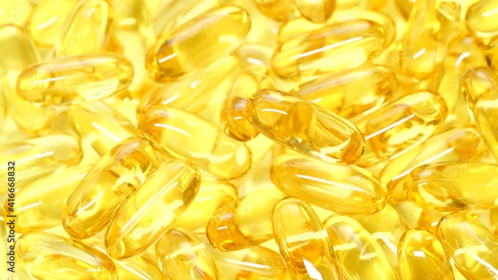 4K closeup Omega 3 fish oil pills background, vitamin E natural capsules texture 4K closeup Omega 3 fish oil pills background, vitamin E natural capsules texture