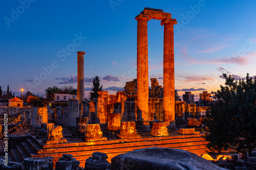 Picturesque view of illuminated remains of temple of Apollo in small Turkish town Didim at twilight