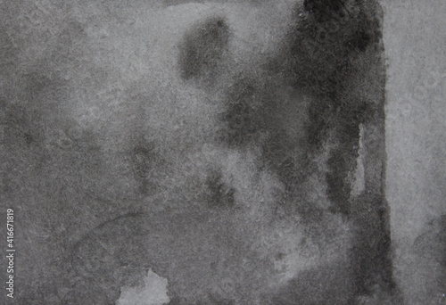 Black background. Old black paper texture with streaks of black and gray paint. Watercolor abstract black background in grunge style