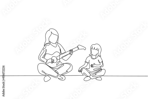 Single continuous line drawing of young mother playing guitar and happy singing together with her daughter at home. Happy family parenthood concept. Trendy one line draw design vector illustration