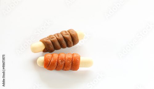 Dog biscuits , dog snack or dog chew in shape of bone 