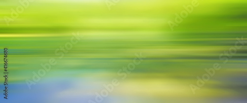 abstract blurred background motion green color seasonal summer blurred leaves nature