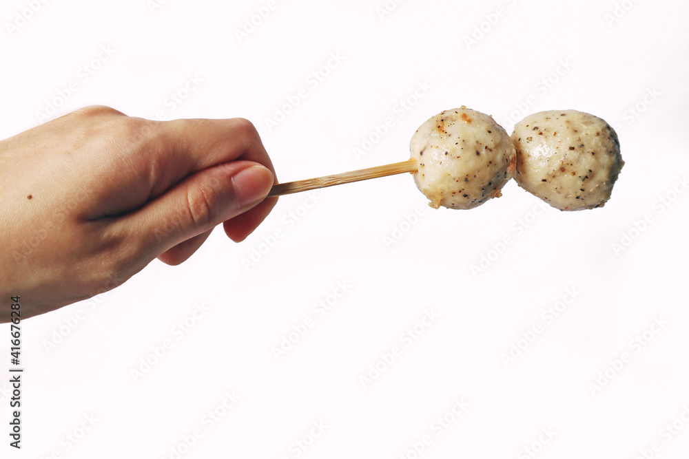 Japanese oden 2 black pepper fish ball, chicken meatball, isolated white meatball delicious yummy fish ball on stick seafood street food Japanese oden 2 black pepper fish ball, chicken meatball, isolated white meatball delicious yummy fish ball on stick seafood street food