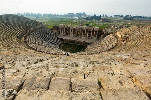 Remains of Hellenistic theatre in ancient Greek settlement of Hierapolis on sunny winter day, Pamukkale, Denizli Province, Turkey..