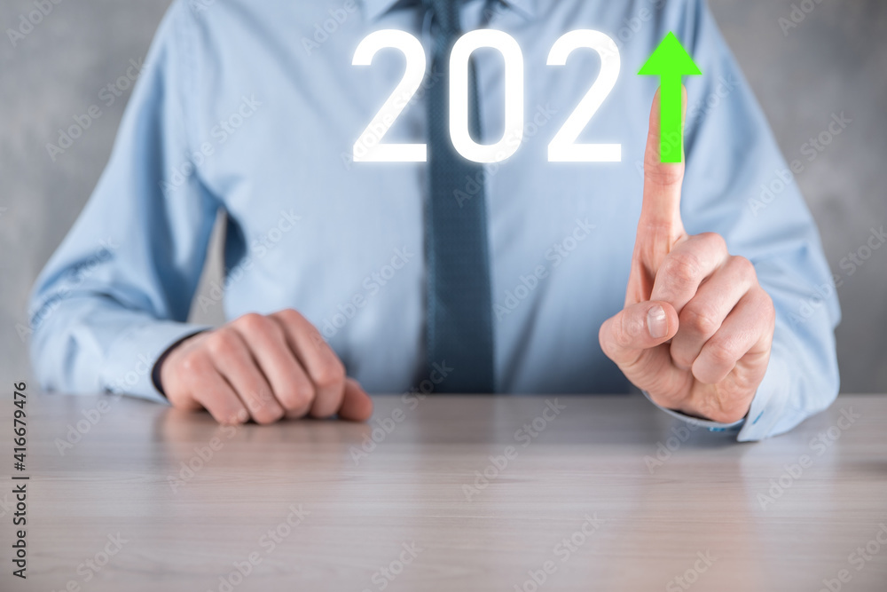 Plan business positive growth in year 2021 concept. Businessman plan and increase of positive indicators in his business, Growing up business concepts. Plan business positive growth in year 2021 concept. Businessman plan and increase of positive indicators in his business, Growing up business concepts.