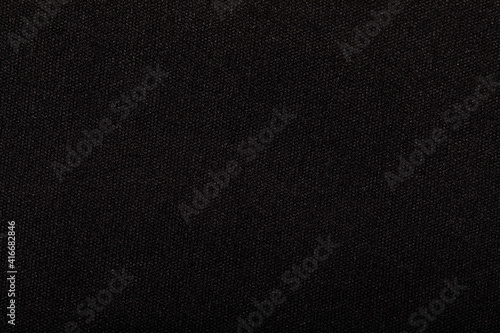 dark black woolen fabric texture. Useful as background for design-works