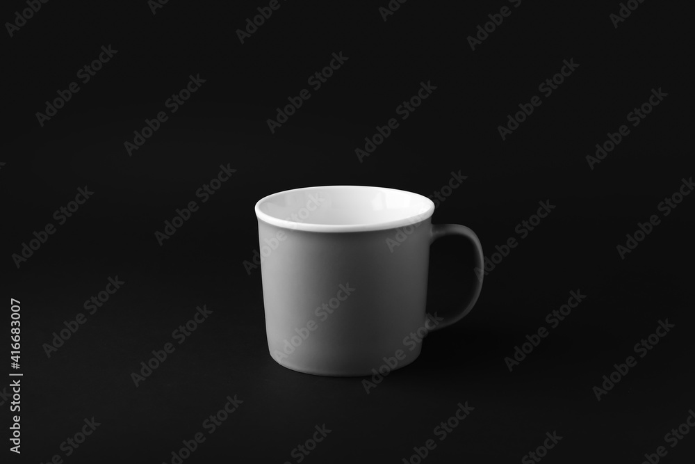 Empty cup on dark background Empty cup on dark background