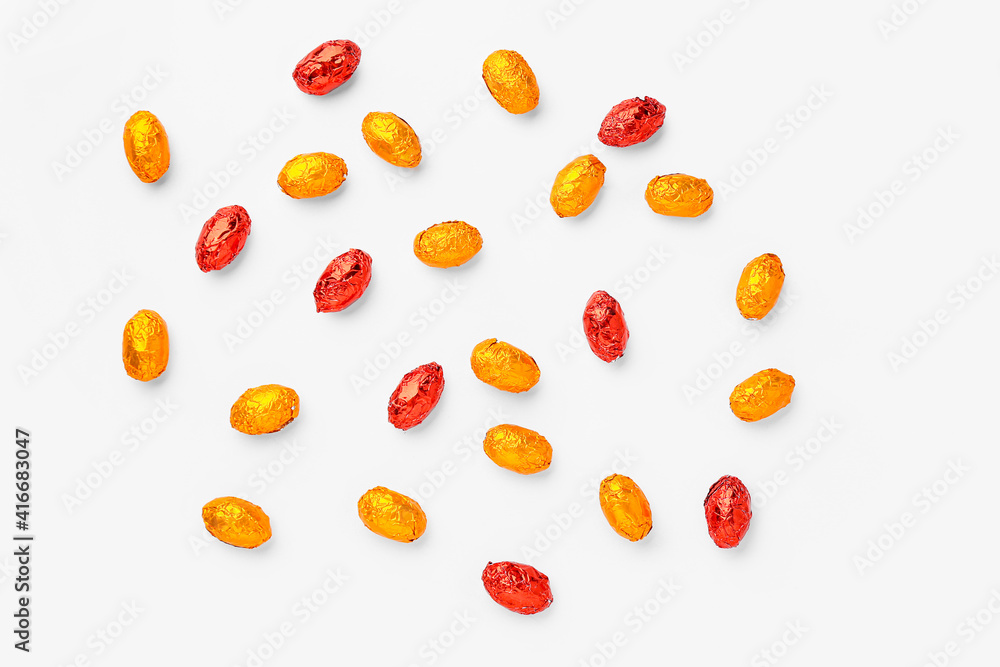 Sweet chocolate eggs on white background Sweet chocolate eggs on white background