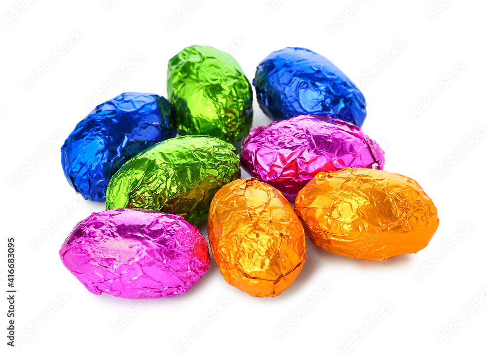 Sweet chocolate eggs on white background Sweet chocolate eggs on white background