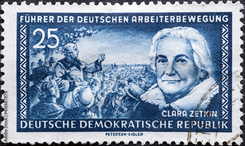 GERMANY, DDR - CIRCA 1955  : a postage stamp from Germany, GDR showing a portrait of the KPD politician Clara Zetkin, assembly text: leader of the German labor movement photo