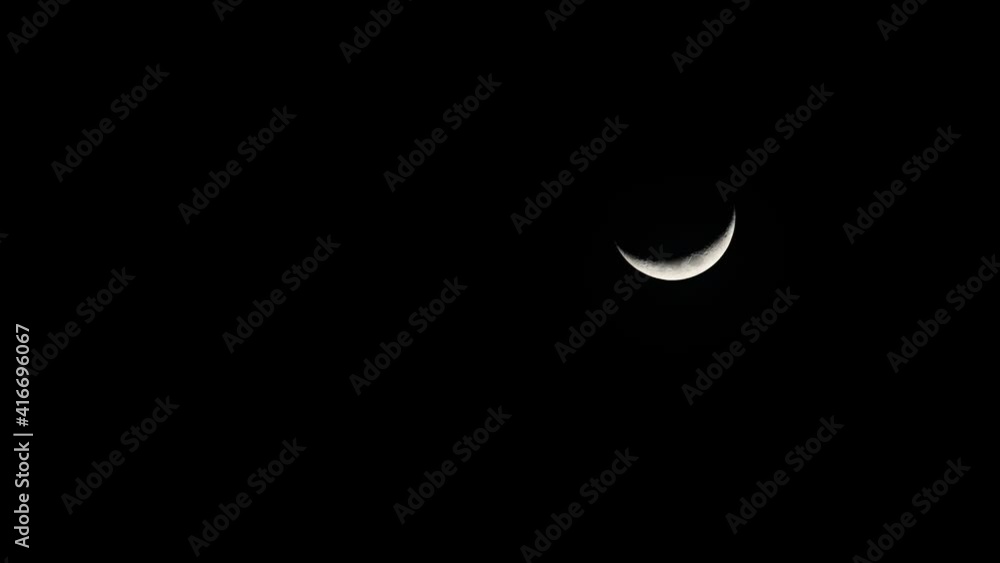 Waxing Crescent Moon, 4K Time Lapse, Descending Moon from the top, going down to the right corner. Waxing Crescent Moon, 4K Time Lapse, Descending Moon from the top, going down to the right corner.