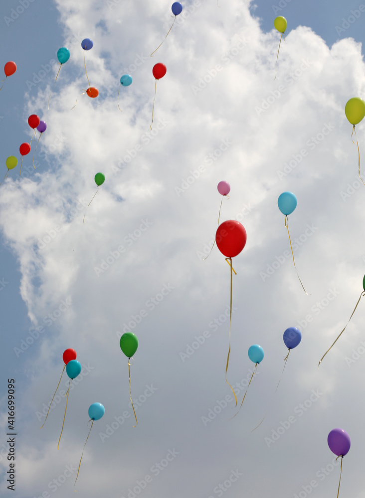 balloons fly high in the blue sky after the big celebration balloons fly high in the blue sky after the big celebration