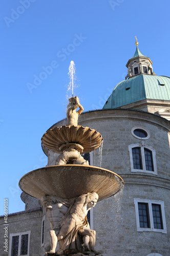 Fountain called residenzbrunnen near Cathedral .. in Salzburg i photo