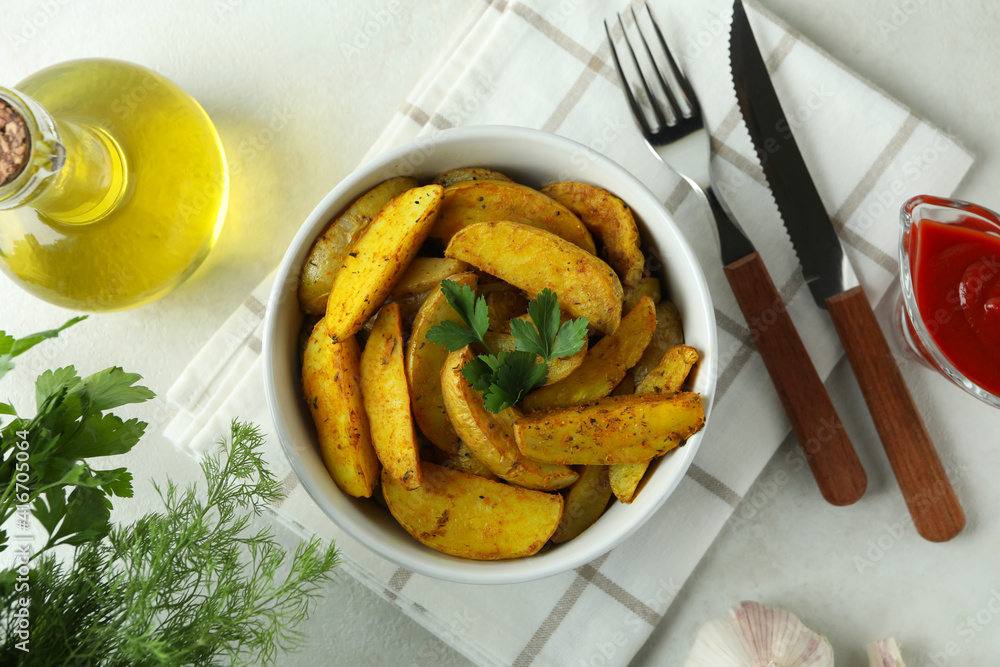 Concept of tasty meal with potato wedges, top view