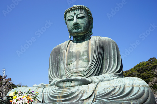 Monumental bronze statue of the Great Buddha in Kotokuin Temple  Kamakura  Japan -                               