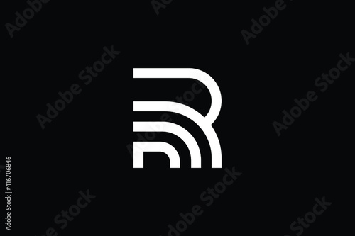 RM logo letter design on luxury background. MR logo monogram initials letter concept. RM icon logo design. MR elegant and Professional letter icon design on black background. M R RM MR photo