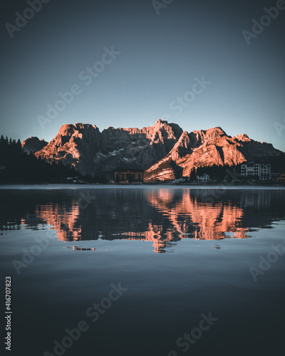 Lake Misurina in the Dolomites Mountains during Morning with glowing Peaks and Reflection in the Water © Maximilian
