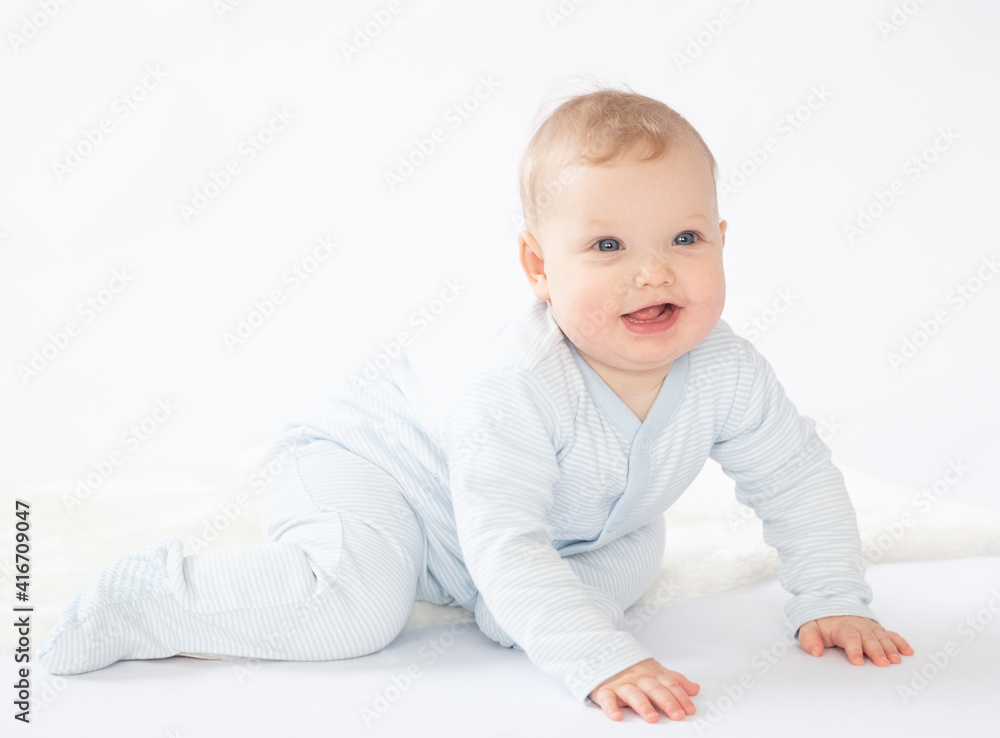 Happy adorable pensive baby plays on a floor, Happy adorable pensive baby plays on a floor,