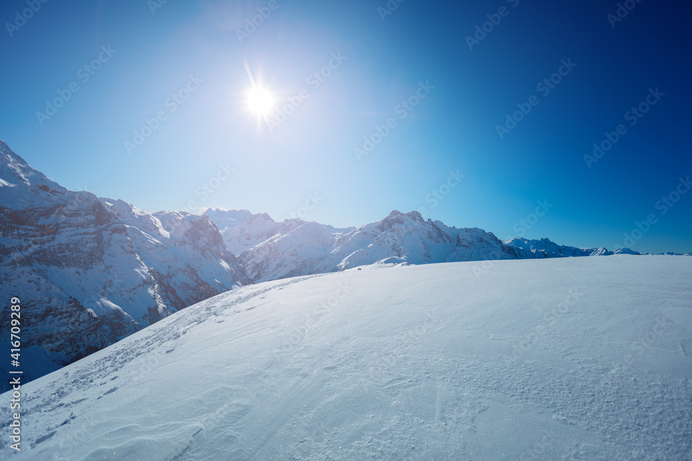 Panorama of French alps tops in Savoie region on sunny day at winter