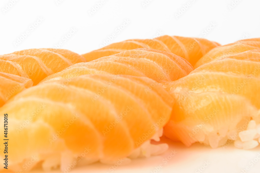 Salmon sushi on white background