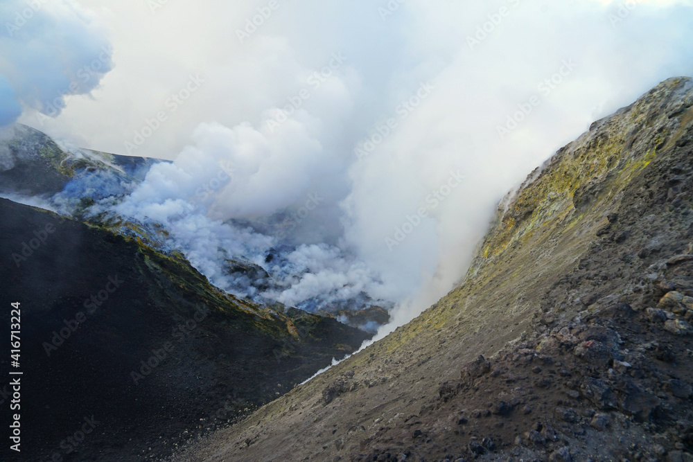 Mount Etna summit crater with active volcanic activity before eruption, Etna summit and crater trek hiking tour concept, Sicily, Italy