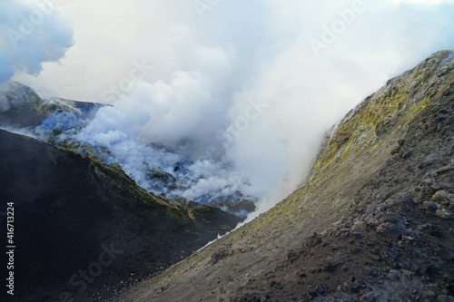 Mount Etna summit crater with active volcanic activity before eruption, Etna summit and crater trek hiking tour concept, Sicily, Italy © Milan