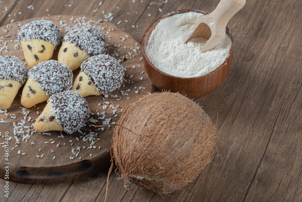 Oak cone shape chocolate cookies on a wooden board Oak cone shape chocolate cookies on a wooden board